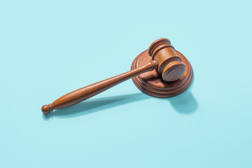 Law and order concept. Gavel judge on a blue background