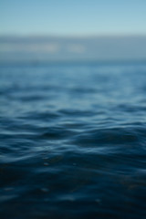 Small waves breaking on a surf beach, New Zealand. 