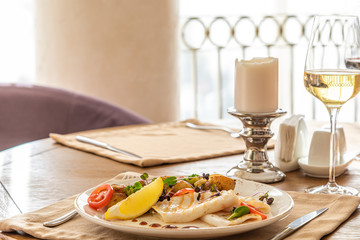 grilled squid with a side dish in the interior