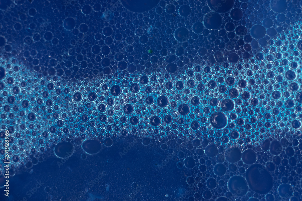 Poster Beautiful abstract blue bubbles background pattern texture for design . Macro view.
