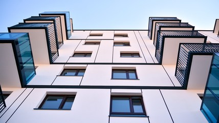 Architectural details of modern apartment building. Modern european residential apartment building complex.