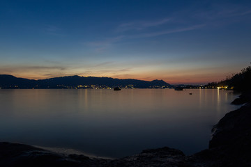 Night view to Traunsee lake with alps mountain from lookout. Long exposure Austria landscape