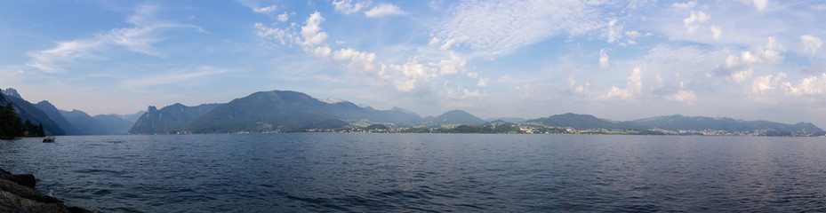 Fototapeta na wymiar Panoramic view to Traunsee lake with alps mountain. Summer Austria landscape