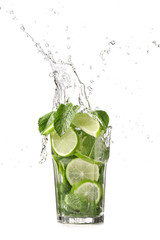 Glass of fresh mojito with splash on white background