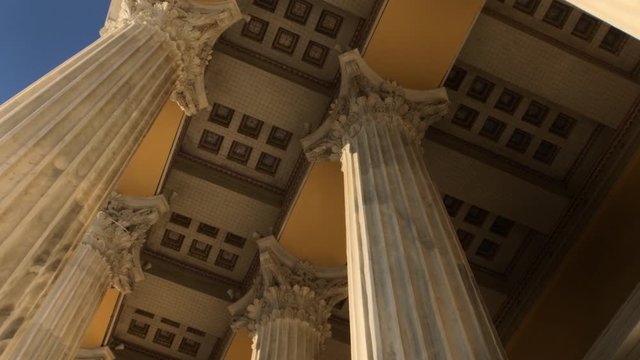 POV, walking between columns of Zappeion, low angle view