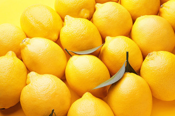 Fresh ripe lemons as background