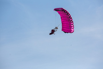City Riga, Latvian republic. Parachutists land with parachutes on target.