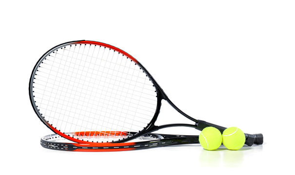 Tennis rackets with balls on white background