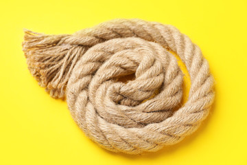 Long rope on color background