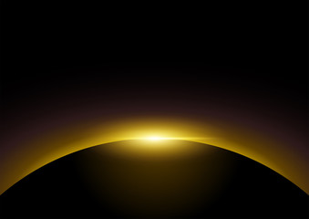 Golden light rising from dark background