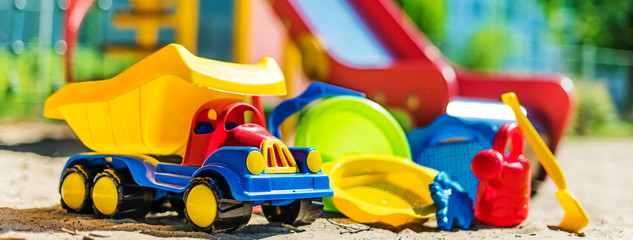 Colorful plastic children toys on the playground