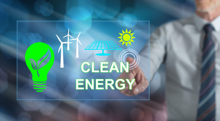 Man touching a clean energy concept