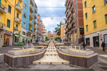Cosenza, Italy - May 7, 2018: View of modern stairs street via Arabia with fountains, multicolored...