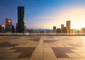 Balcony empty brick platform with sunrise scene city skyline