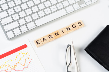 Earnings management concept with letters