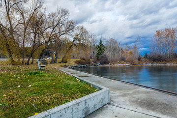 Fototapeta na wymiar Autumn city park near water. Somers fishing place at Flathead Lake, Montana