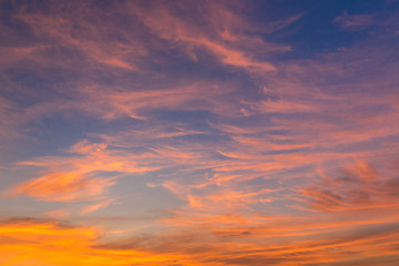 Blue and golden pink clouds sky abstract
