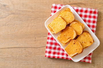 crispy bread with butter and sugar
