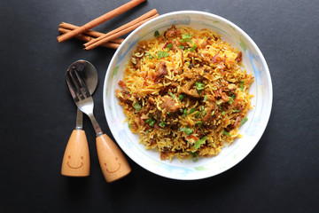 Mutton Biryani or Lamb Pulao. Garnished with fried onion & chopped coriander. Biryani is a famous...