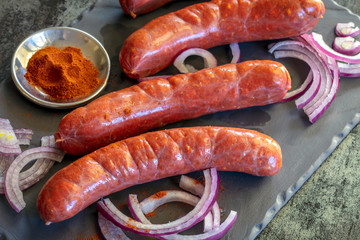 Chorizo Sausages with Paprika and Red Onion