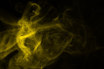 Yellow steam on a black background.