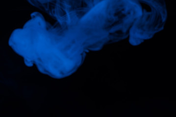 Blue steam on a black background.