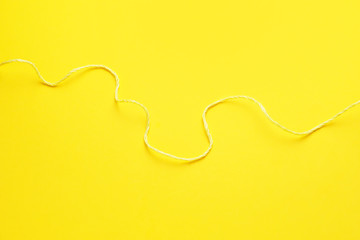 Long rope on color background
