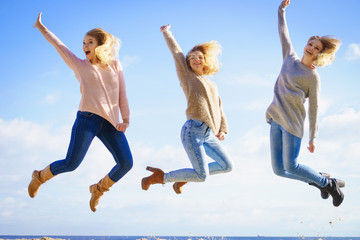 Fototapeta na wymiar Three women jumping