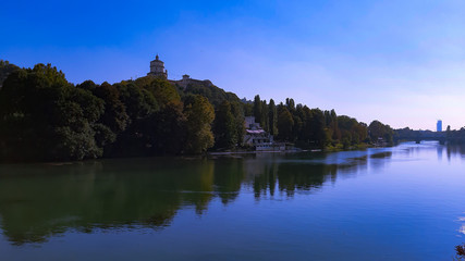  Reflection of sunrise for blur background in summer days over the water. Clear blue sky hot climate in summer days.