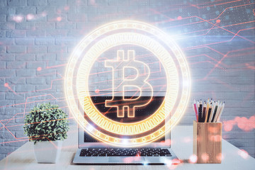 Double exposure of blockchain and crypto economy theme hologram and table with computer background....