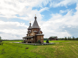 Fototapeta na wymiar Wooden Orthodox Christian Church of Spyridon Trimifuntsky. Russia