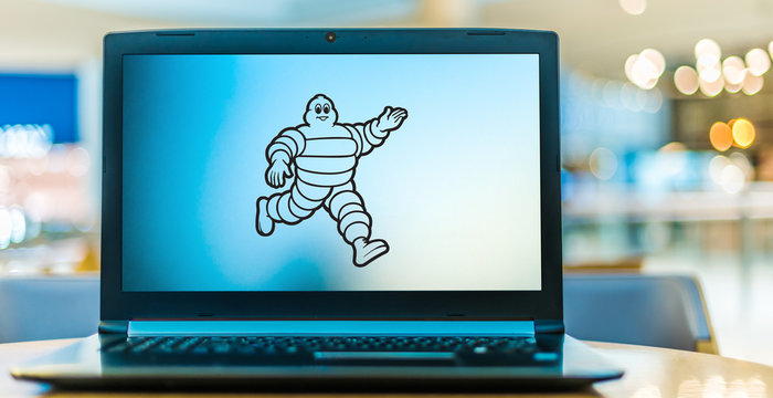 Laptop computer displaying logo of Michelin