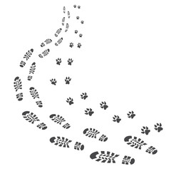 Imprints of the tracks of human boots and animal paws of a dog.