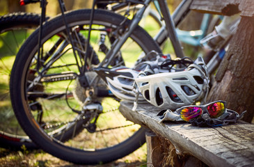 A bicycle helmet, gloves and sunglasses are all you need to ride a bike.