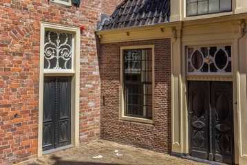 Fototapeta na wymiar Old red brick houses in the historic center of Assen, Netherlands