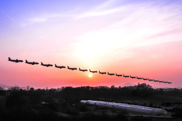 Airplane trails and trajectory photo with blue sky.