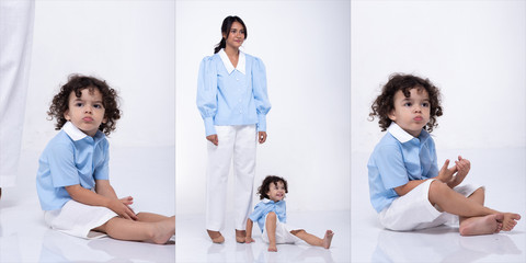 Fototapeta premium Asian Mother Caucasian Daughter Little girl hold mom hand and smile with love