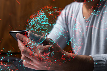 Obraz premium Man using phone. Hands typing smartphone. Double exposure with world map planet earth hologram. Close up. Internet and people connection concept.