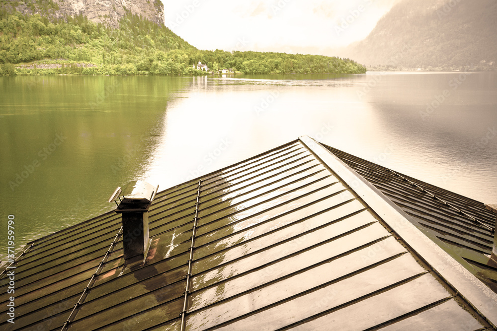 Canvas Prints austrian landscape with wet roofs.