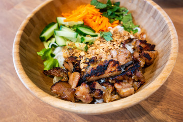 Pad Thai, vegan recipe made with rice noodles, vegetables and peanuts cooked on wok