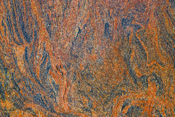Abstract textured background of polished sandstone