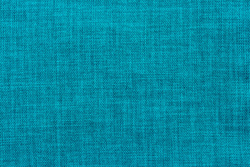 Teal textile material background. Hessian fabric with natural texture. Cloth backdrop.