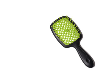 green comb on white background