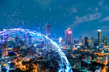 Abstract technology icons, night aerial panoramic cityscape of Bangkok, Asia. The concept of innovative approach to optimize international business process. Double exposure.