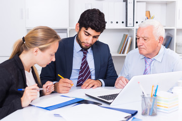 Fototapeta premium Managers are writing financial reports in the office.