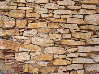 Real antique spanish stone wall background texture