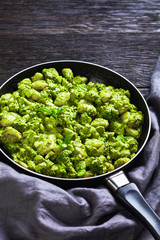 italian gnocchi with pesto and broccoli florets