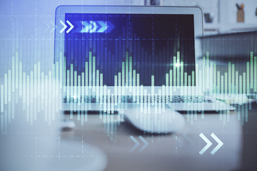 Financial market graph hologram and personal computer on background. Multi exposure. Concept of forex.