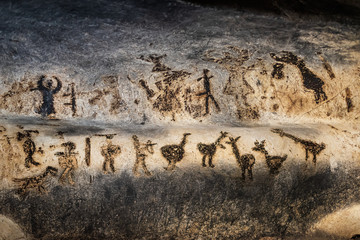 Prehistoric art wall cave paintings dating from Epipaleolithic (Stone Age), Neolithic (New Stone...