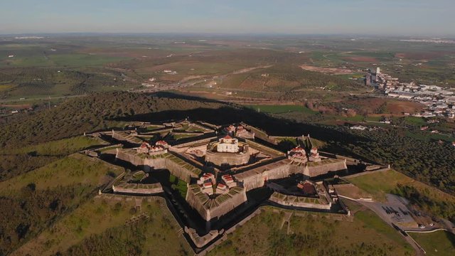 Establishing shot of the fort of Nossa Senhora da Gra&ccedil;a catching the evening light.